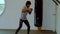Young male athlete exercising kickboxing video. Healthy lifestyle concept