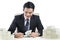 Young Male banker is counting banknotes on white background