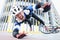 Young male cyclist wearing helmet and protective gear fell off bike and flying portrait