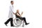 Young male doctor pushing a mature male patient making a rock and roll hand sign in wheelchair