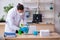 Young male doctor virologist in the office