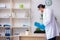 Young male doctor virologist in the office