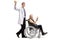 Young male doctor waving and pushing a mature male patient making a rock and roll hand sign in a wheelchair