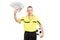 Young male football referee holding a stack of money