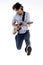 Young male jumping high holding his guitar