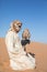 Young male pharaoh eagle owl during a desert falconry show in Dubai, UAE.