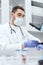 Young male scientist wearing gloves in lab