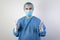 Young male surgeon stand uniform doctor health care white medical gloves