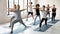 Young male trainer leading yoga class for concentrated multiracial students.