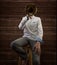 Young Male Violinist portrait against barn door wall