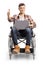 Young male in a wheelchair with a laptop showing thumbs up