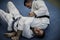 Young males practicing judo together.