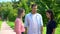 Young man between angry women looking each other, relations conflict, jealousy