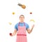 Young man in apron juggling with fruits