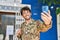 Young man army soldier make selfie by smartphone at street