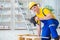 The young man assembling wood pallet