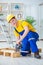 The young man assembling wood pallet