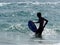 Young Man In Atlantic Ocean On Ilha De Tavira Portugal