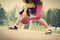 Young man on basketball court dribbling with ball. Vintage