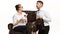 The young man and beautiful woman in business suit at office on white background