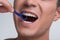 Young man is caring for his oral health