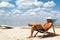 Young man on a chair on a beach