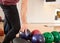 Young Man Choosing Bowling Ball From Rack