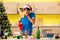 Young man cleaning kitchen after Christmas party