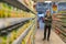 Young Man Contemplating Choices in Grocery Store Aisle