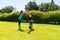 Young man doing handstands in the park with