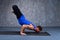 Young man doing the pose of yoga