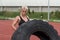 Young Man Doing Tire Workout Outdoor