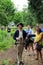 Young man dressed in soldier\'s garb, guiding people through historic King\'s Garden,Fort Ticonderoga,New York,2014