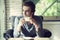 Young man drinking coffee in cafe