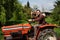 Young man driving a tractor