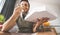 Young man eating pizza delivery at home - Happy guy having meal while playing video games in living room