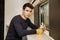 Young man eating refreshments on a train