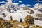 Young man enjoying the stunning view of Bernina mountain range and Morteratsch glacier