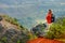 Young man enjoying view into Waimea Canyon