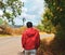 Young man enjoying at wild sunflower forest