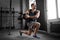 young man exercising with medicine ball in gym