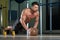 Young Man Exercising Push Ups On Medicine Ball