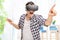 Young man experiencing virtual reality