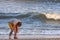 a young man filled up to lift a beautiful shell