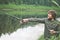 Young Man Fisherman bearded fishing with rod