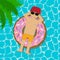 Young man floating on an inflatable circle in a swimming pool. Boy in sunglasses and cap swimming in swim ring in donut form.