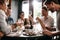 Young man with friends at restaurant