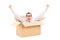 Young man gesturing happiness deep inside a box