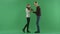 Young man gives his girlfriend not the best Christmas gift, chroma key on background