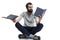 A young man with glasses and a beard sits in a yoga pose and holds books in his hands. Education and training. Isolated on a white